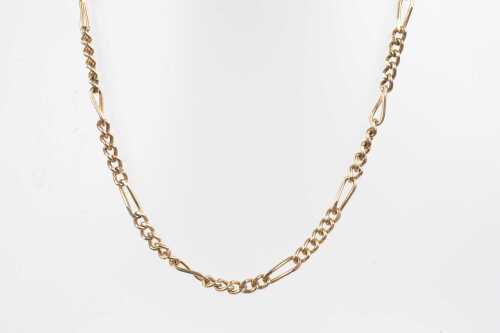 A figaro link necklace in 9ct yellow gold.