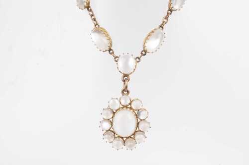 A vintage moonstone necklace in 9 carat yellow gold.