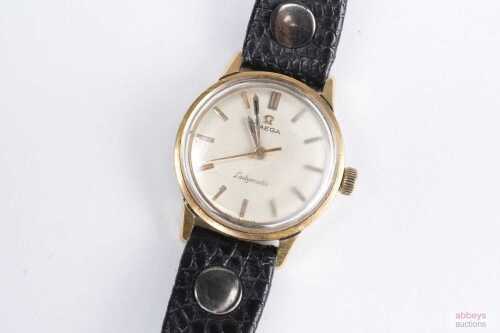 A vintage ladies Omega Ladymatic watch in 18ct yellow gold.