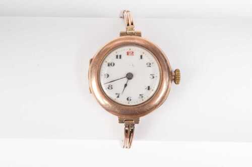 A Rolex Wilsdorf and Davis ladies mechanical wristwatch in 9ct rose gold on rolled gold bracelet