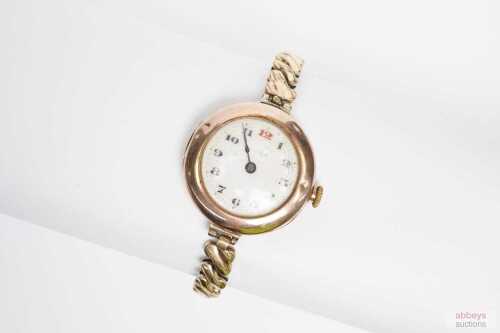 A Rolex Wilsdorf and Davis ladies mechanical wristwatch in 9ct rose gold.