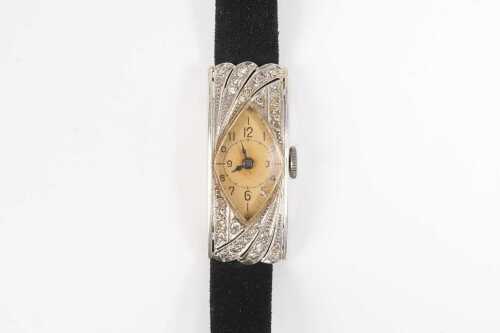 A vintage diamond ladies watch in 18 carat white gold.
