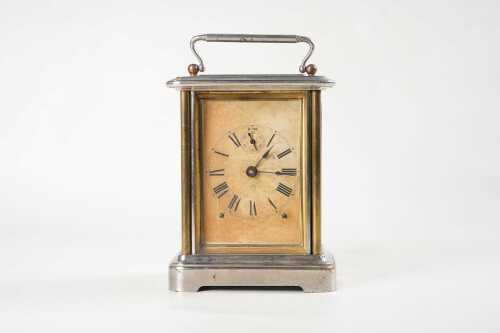 An antique Ansonia eight day carriage clock
