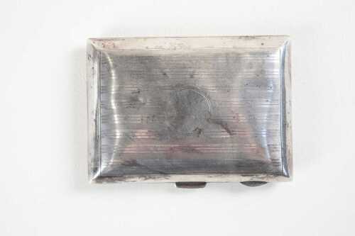 An antique English sterling silver cigarette case. Weight 141g