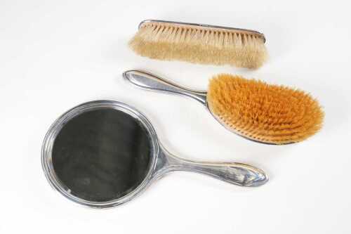Three antique English sterling silver dressing table items