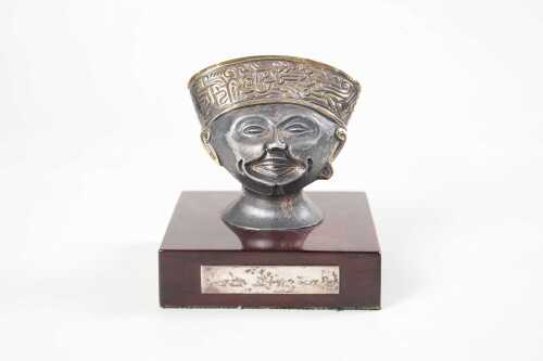 Mexican parcel gilt silver bust on timber base, weight of silver 167g
