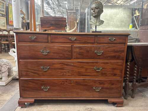 A Georgian mahogany chest of seven drawers