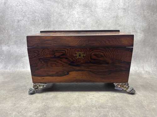 A Regency rosewood sarcophagus form tea caddy