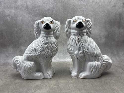 A pair of Victorian Staffordshire ceramic spaniel dog figures
