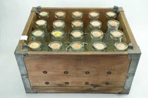 Vintage milk crate containing 20 one-pint milk bottles