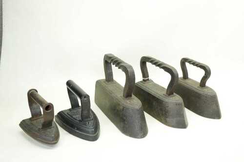 Collection of antique cast iron irons