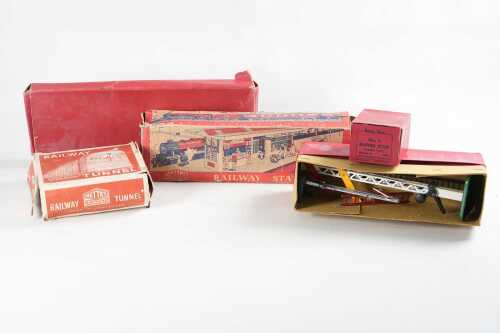 Five vintage Hornby and Mettoy O scale model train accessories