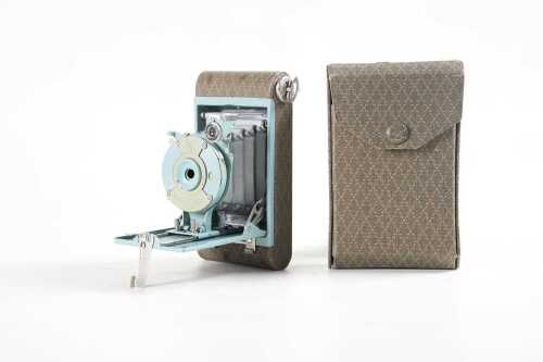 A Kodak Petite folding autographic 127 film camera in grey/green.