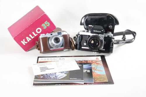 A Nikon F2 Photomic SLR 35mm film camera, plus a Kowa Kallo 35 camera