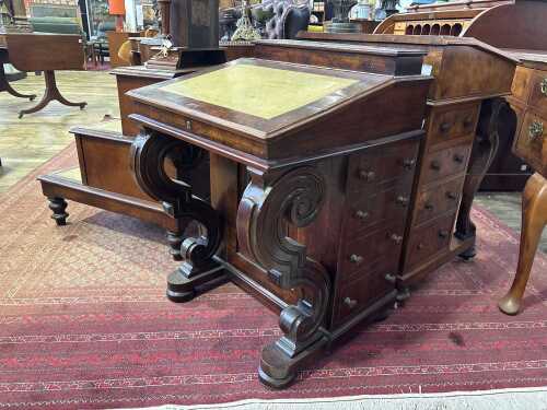 A Victorian figured walnut davenport