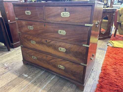 A Victorian flame mahogany campaign chest