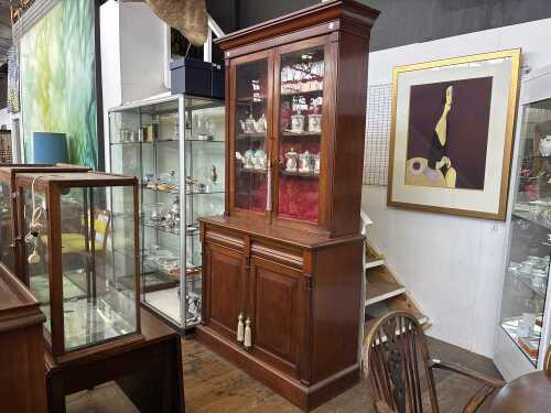 An antique walnut bookcase