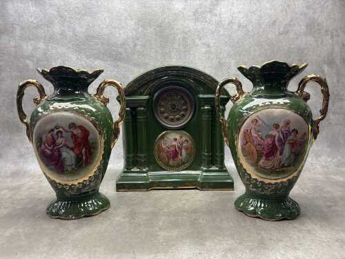 An antique English Royal Warwick green and gilt ceramic clock and garniture set