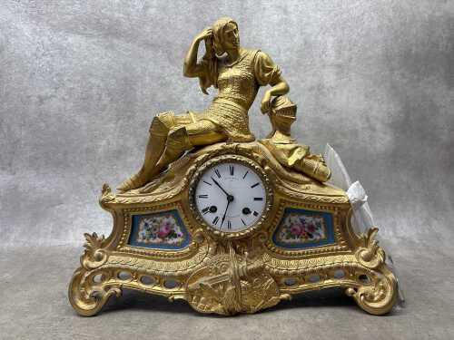 An antique French gilt spelter figural mantel clock