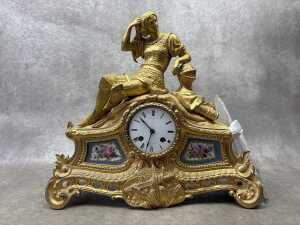 An antique French gilt spelter figural mantel clock
