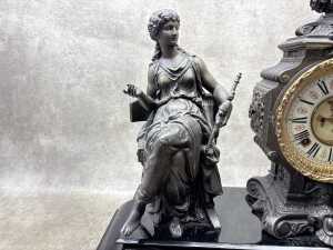 An antique Ansonia cast metal mantel clock with figure of seated lady - 4