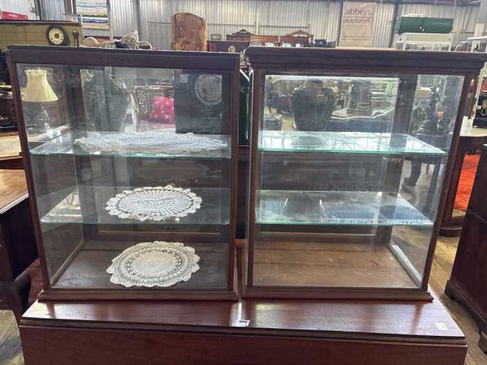 Two antique countertop display cabinets