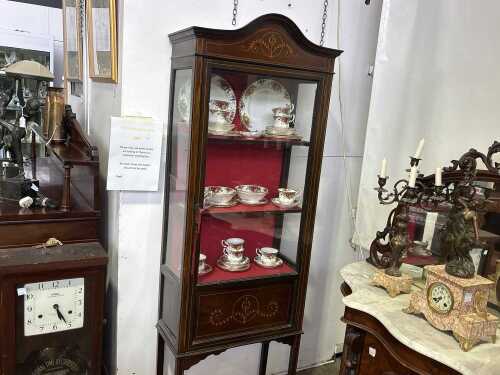 An antique Sheraton Revival display cabinet