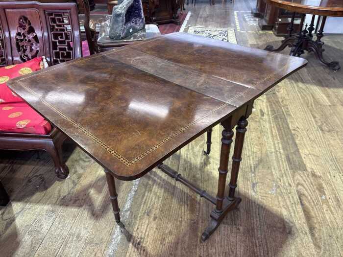 A Victorian burr walnut sofa table