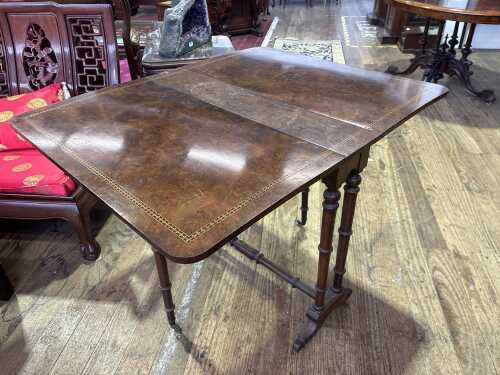 A Victorian burr walnut sofa table