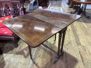 A Victorian burr walnut sofa table