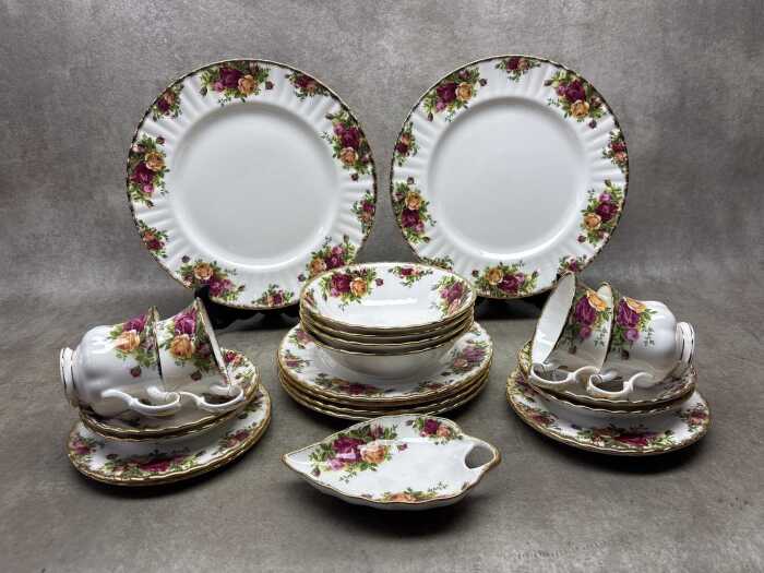 A Royal Albert Old Country Roses porcelain dinner setting for four