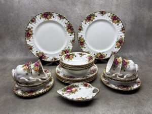 A Royal Albert Old Country Roses porcelain dinner setting for four
