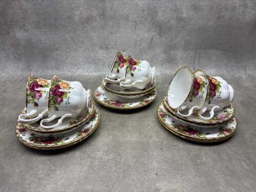 Six Royal Albert Old Country Roses porcelain trios.