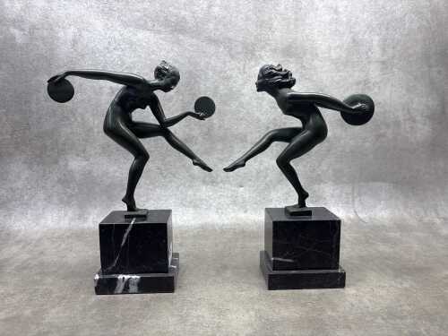 Pair of Art Deco style painted bronze figures on marble bases