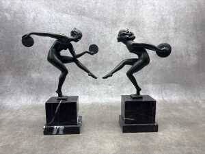 Pair of Art Deco style painted bronze figures on marble bases