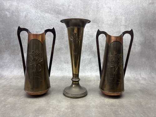 Three Art Nouveau brass vases including pair with repousse wattle design