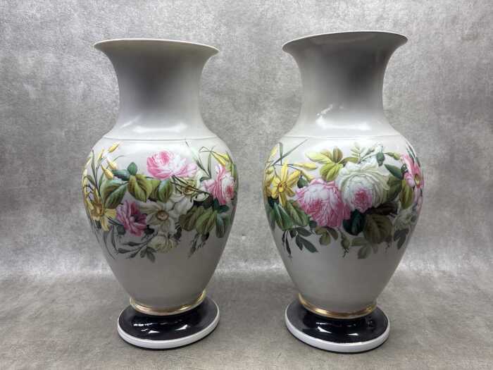 Pair of antique porcelain vases with hand painted floral decoration