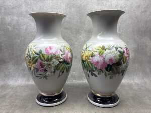Pair of antique porcelain vases with hand painted floral decoration