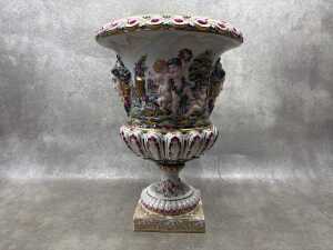 A Capodimonte Italian porcelain urn with hand painted relief scenes of puttis dancing and camping - 3