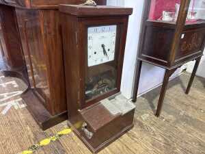 An antique National time clock - 2