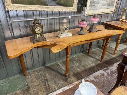 A Huon pine live edge console table