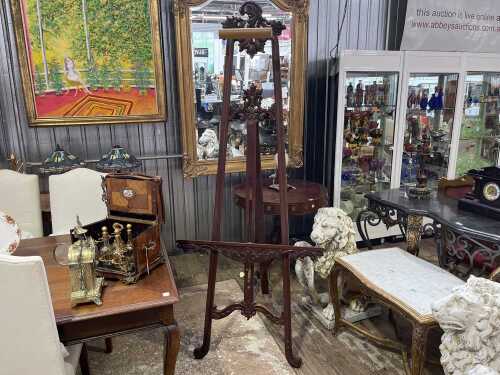 A vintage carved timber easel