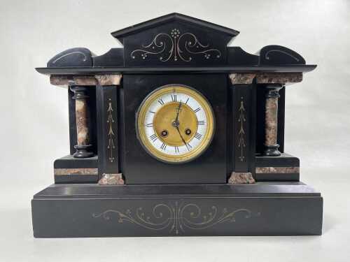 An antique French mantel clock