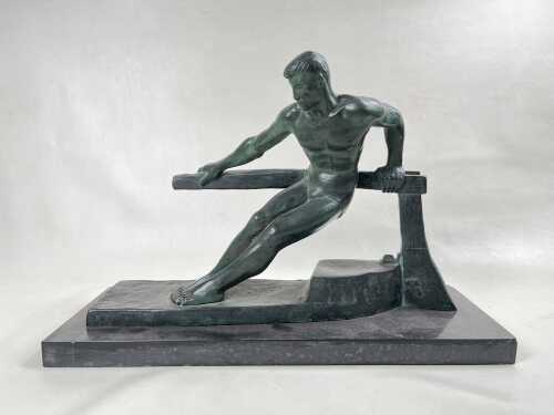 Jean De Roncourt, after. Man and tiller, Art Deco spelter sculpture on black marble base
