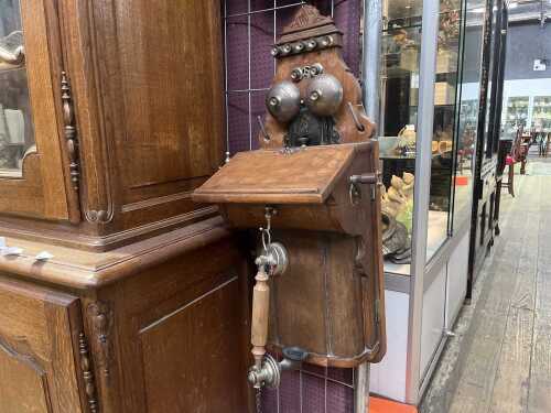 An antique Commonwealth Ericsson wall telephone with handset, c1890s
