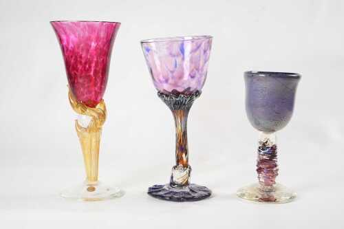 Three Australian hand blown coloured art glass goblets