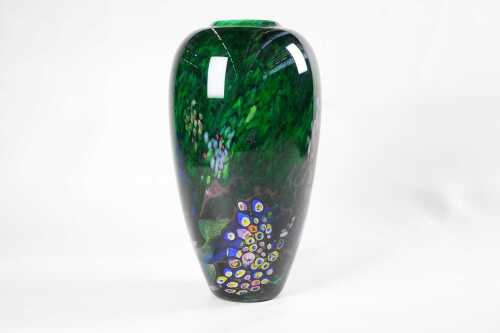 A multi-coloured art glass vase
