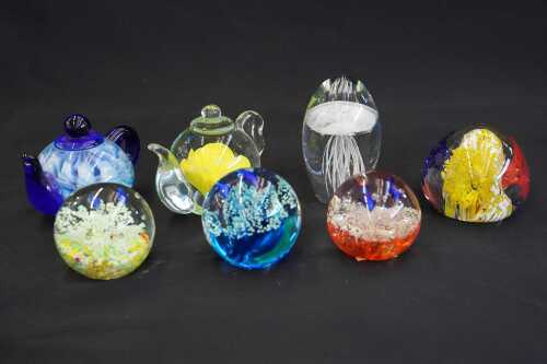 Seven art glass paperweights