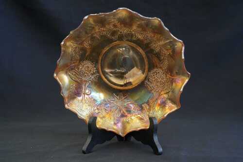 A Crown Crystal marigold carnival glass Kookaburra master bowl