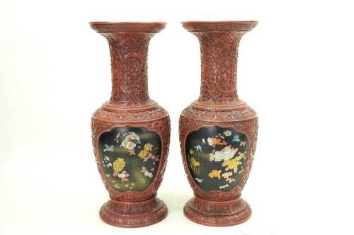 Pair of antique Oriental cinnabar style cast spelter vases with relief scenes, c.1900